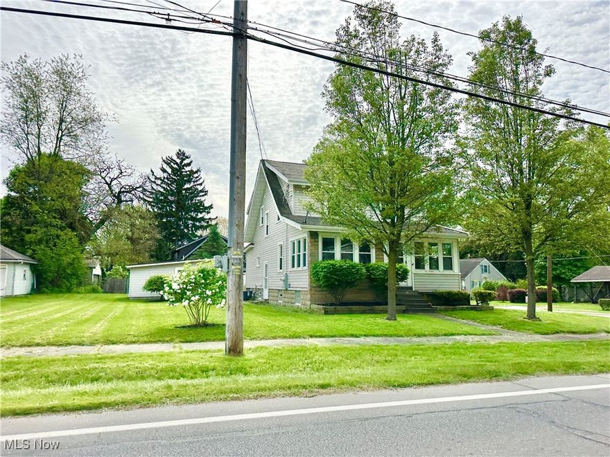 Beautifully updated 3-bedroom, 1.5-bath home, ideally situated on a spacious double lot. This home offers the perfect blend of character and convenience with features like updated kitchen & both baths, an oversized 2-car garage and classic architectural details throughout.

Enjoy the warmth of a formal dining room complete with built-in cabinetry—perfect for hosting or everyday dining. Relax year-round in the stunning four-seasons sunroom with panoramic views, or step outside onto the oversized deck, ideal for entertaining or enjoying peaceful evenings outdoors.

With room to grow and timeless features, this home is a rare find in the heart of Mogadore.