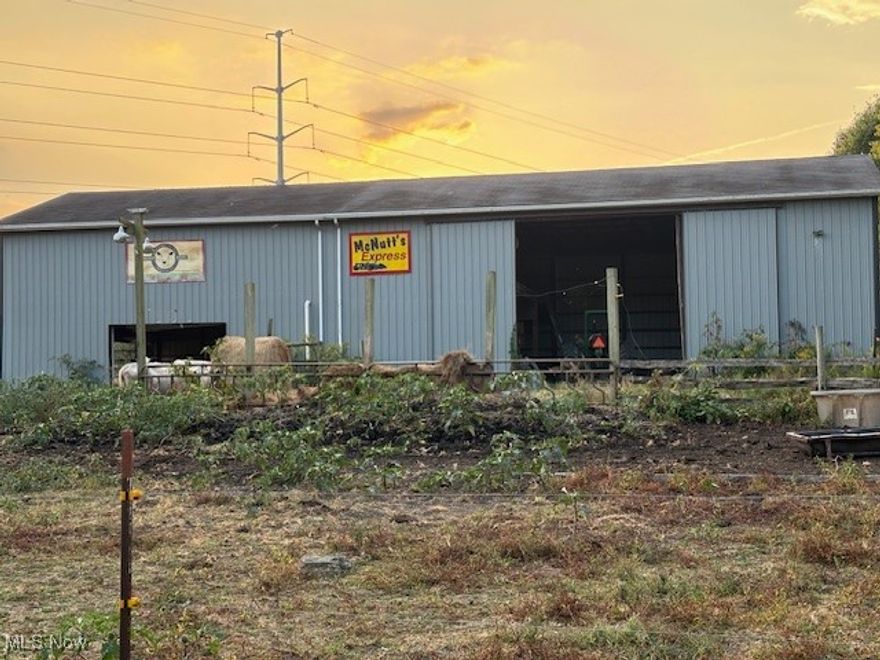 10 +/- acre farm property featuring a 36 X 84 barn, mostly cemented. Great location to build a new home and start a farm. Close to Atwood Lake for fishing and boating. The property has frontage on Ivory Rd and Avalon Rd. The seller has 4 cows on the property. Do not go into the electric fence area.  The seller receives a CAUV credit, and the buyer is responsible for recoupment. Farm equipment will not transfer with the sale.