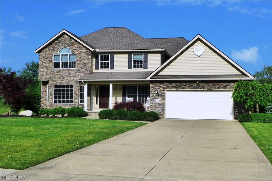 Just Drive-By this North Mentor Colonial and enjoy fantastic curb appeal, landscaped yard w/ back patio and privacy views with no one in your back yard!  Located on one of the most desirable streets in Mentor, this 2568 Square Foot Center Hall Colonial offers 4 Bedrooms, 2 1/2 Baths, Office, Custom Cabinets all in a secluded scenic country setting!  Highlights include inviting front porch, 2 Story Foyer, Huge Back Patio with Privacy, Master Bedroom with Vaulted Ceilings and Large Walk-In Closets with Master Bath with two vanities, each with its separate vanity space.  Main Bath w/ Separate Shower area making getting ready efficient for the largest of families!  With High Efficiency Furnace, Power-Vent Water Heater, Added Blown In Insulation and Pella Windows, you can be assured of low energy costs as well.  High Ceilings in the Basement and rough in for bathroom could make for an easy basement remodel.  Home includes 1st Floor Laundry, Sprinkler System, Security System and Gravity Wate