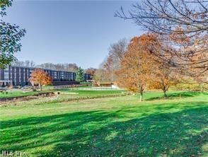 Silver Lake Towers is a well maintained and managed community for folks that are 55 or older, some exceptions apply. It's beautiful setting includes mature trees, an inground pool and clubhouse, shuffleboard courts, and a path to the Adell Durbin hiking trail. This condo is located in building D which recently had all of the common areas redecorated with new carpet, paint and decor. Building D also houses the party room, game room, exercise room, library and two hotel rooms for guests or family. This condo has beautiful views from all rooms overlooking the woods. It includes an attached garage parking space #188 and storage room #2. All utilities are included in the monthly fee, each floor has a laundry room. The spacious living / dining room has sliders to the enclosed porch. There is an eat in kitchen, large bedroom with double closets all with neutral decor that is light and bright throughout. Call today!