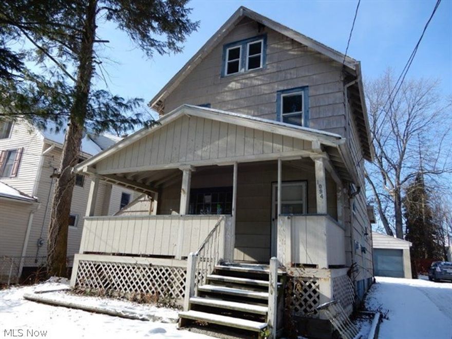 Great investment potential in this North Hill colonial - 3BR, 1BA, large 2 car garage, at a great price!