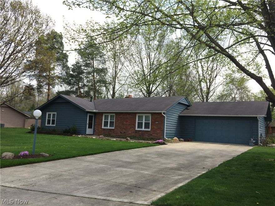 This spacious Mills Creek ranch home situated on an over-sized lot is ready to be yours! Updates include newer hot water tank, newer door and opener for the two car garage, newer front door, and vinyl replacement windows. Living and dining room both with wood laminate flooring. Kitchen features all appliances. Large family room with a wood-burning fireplace and skylight connects to the family/recreation room that can easily be turned into a 4th bedroom! Master bedroom features walk-in closet and private master bath with step in shower. Two additional bedrooms with second full bath as well. Laundry room includes washer and dryer. Concrete patio in the back yard for enjoying the upcoming warmer months! Call today for your private tour!