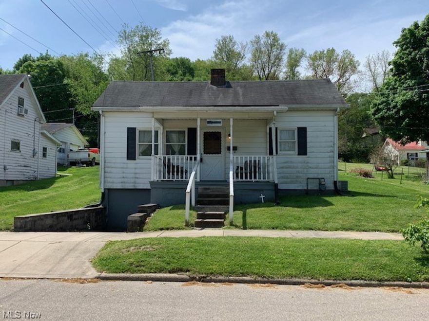 Cute southside bungalow with a big backyard. Spacious living room, eat-in kitchen w/breakfast bar. Would make a great starter home, lots of potential w/some TLC Unfinished basement w/1 car garage. MWCD Tax Assessment is $6.00 a year.  Possession will be 2 weeks after closing.