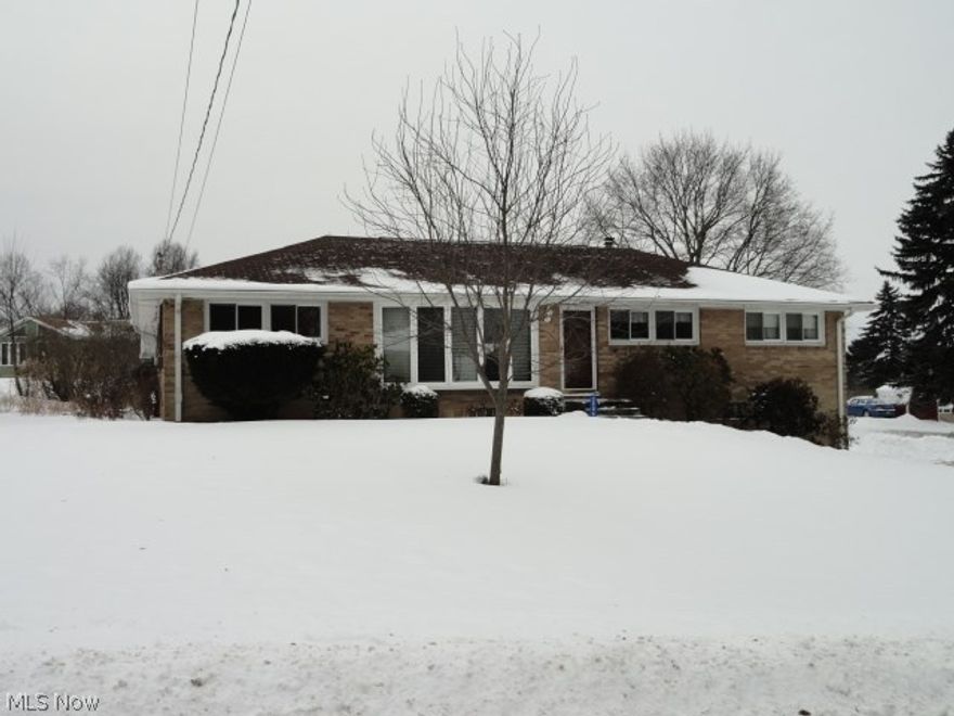 1 owner well maintained brick ranch with split bedroom plan and master bedroom with it's own bath.  Updated, fully applianced kitchen, dining room and hardwood floors under carpet.  Bright & sunny enclosed porch and 3 car tandem garage.  Blown in insulation added, updated furnace, air & windows.  City utilities too.  You'll love the convenient location to B.V., I-77 and schools.