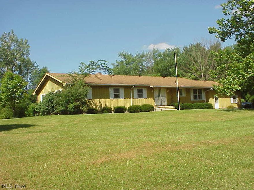 Sprawling country ranch, on 14+ private wooded acres, overlooks a peaceful valley. Large eat-in kitchen, with formal dining room or nearby patio for dining Al Fresco. Multiple fireplaces, one with wood burner in the glass walled, high ceilinged, 54 x 32 walkout basement. Pastoral views from every window, and yet, totally private! Attached two car garage, with an additional clear span building for hobbies or extra storage. Bring your 4-H projects--there is a Yankee Barn with room for 6 horse stalls and a full loft, too. Secluded pond is home to chirping frogs for that peaceful "night music"! Heirloom apple and pear orchard creates a serene habitat for abundant wildlife. This property was lovingly created by these original owners in 1972. The home, the lovely forests, the quiet pond. Now it is time for a new family to make the updating and changes to create their own memories here.