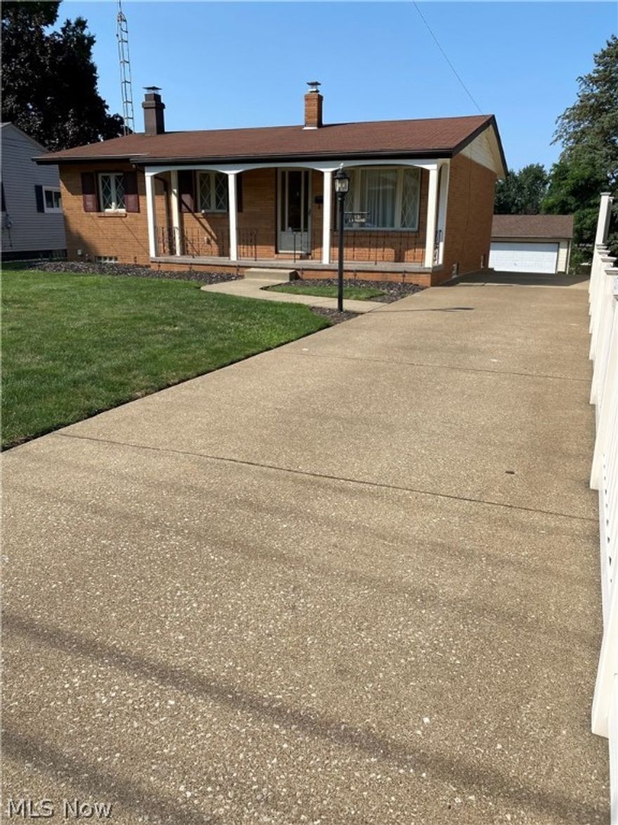 Amazing home with so much to enjoy for entertaining, family gatherings and just good living.  Total square footage in this home with the Sun Room (266) and walk out lower level (586) added to the Auditor main house is total of 1,853 sq. ft.  Too much to put into this space, but starting with interior you will find quality throughout, updated windows, newer furnace/AC and much care taken with this home.  The kitchen appliances stay (there is gas connect behind the range) as well as a refrigerator in the lower level.  The large master bedroom was two at one time, the other bedroom has sliders to the Sun Room which is the place to be on most days.  From the Sun Room is decking that leads to a Gazebo, exterior solar lighting.  The garage with newer roof is oversized 2 car and clean and a shed close by it for storage allows the garage even more space.  The drive is HEATED and provides plenty of parking for guests.  NOW---the lower level!  Wow, that is the place that warms the heart--a large