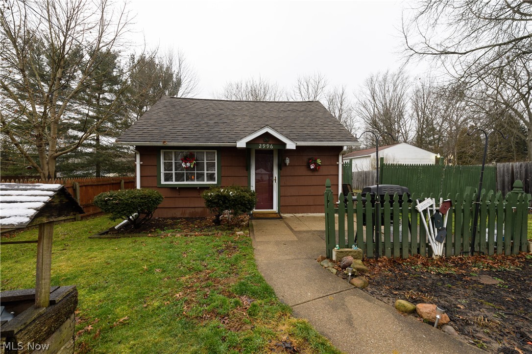 WOW! You do NOT want to miss your chance to see this cozy cape cod in Coventry Local School District. Set back off the road with a paved driveway, this home features 2 bedrooms including a large master with an awesome master bathroom. The kitchen comes stocked with all the appliances in excellent condition. This home has a newer roof, furnace, sump pump, and aeration tank. Complete with an addition on the back, partial basement, and central air conditioning, this home will NOT last! Call today to set up your own private showing before it's too late!