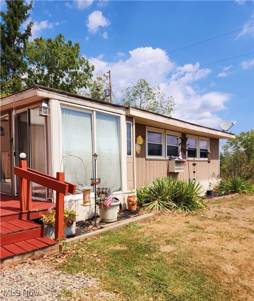 PRIME Lake Location on top the Hill at Seneca Lake! This private owned land has 4 lots with exceptional views
and offers privacy from other homes! The quaint 2 Bedroom, 1 Bath home features Eat-In Kitchen, Large Living Room, and
Enclosed Porch. The Gravel Driveway and Detached Garage offers plenty of parking options. 2 sheds are included for
additional storage options. Need more living space? This is an Ideal location to build your dream lake home, while you use
the current one for weekend R and R! During your tour, check out the Docks at the East Cove Boat Club and ask your agent
for details of joining! Year Round or Vacation, this property offers the perfect view! Call your agent today to schedule your
tour of this rare opportunity at Seneca Lake!