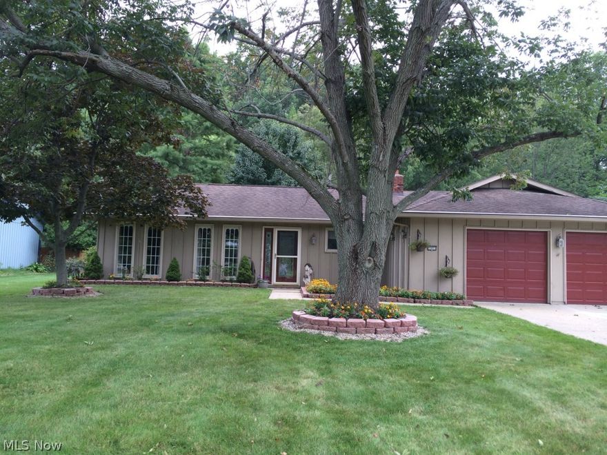 You must see the interior of this totally updated contemporary home. Both updated baths have heated floors. New carpeting, new doors, light fixtures. Amazing family room with wet bar, beverage and wine cooler, changing colors by remote to suit your mood. Ultra contemporary glass fireplace and hook ups for HDMI and wireless surround.  Huge master with step down shower. Eat in kitchen has ceramic floor and all appliances stay including one year old washer and dryer. Good sized laundry room. Totally privacy fenced with solar lights. TV in master bath stays. You will love it. Priced to sell.