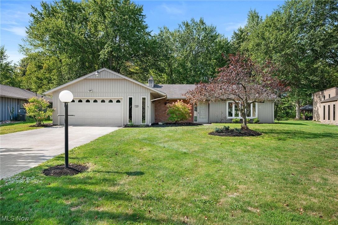 Don’t miss this rare opportunity to own one of Mills Creek’s spacious ranch homes on nearly an acre—at an unbeatable price! This 3-bedroom, 2.5-bath ranch sits on a stunning park-like, fully fenced lot and includes a charming, generously sized shed perfect for gardening and potting tools. Step inside through the slate-tiled foyer, where the living and dining rooms await to your right. The beautifully renovated kitchen (2013) features abundant quartz counters, a center island, two pantries, newer appliances that stay, and plenty of cabinetry. Just off the kitchen, the expansive family room showcases a beautiful gas stone fireplace just waiting for cozy evenings! From there, enjoy the light-filled 3-season room—added by the current owner—complete with tiled floors and vented windows. The bedroom wing offers privacy and comfort, with a massive primary suite large enough for a sitting area. The suite includes an ensuite bath, walk-in closet, and additional closet. Two more spacious bedrooms, a full bath, and a large office/den (ideal for a home gym, playroom, or guest space) complete the home. Mills Creek Association offers amenities like none other! If you have a budding tennis star or swim team participant look no further! You will also enjoy a clubhouse, playground and expansive green spaces! New roof coming in 2-4 weeks! Newer furnace (2020) New LVT flooring in much of the home as well as fresh paint in some rooms! Call today for details and a private tour of this fabulous home!