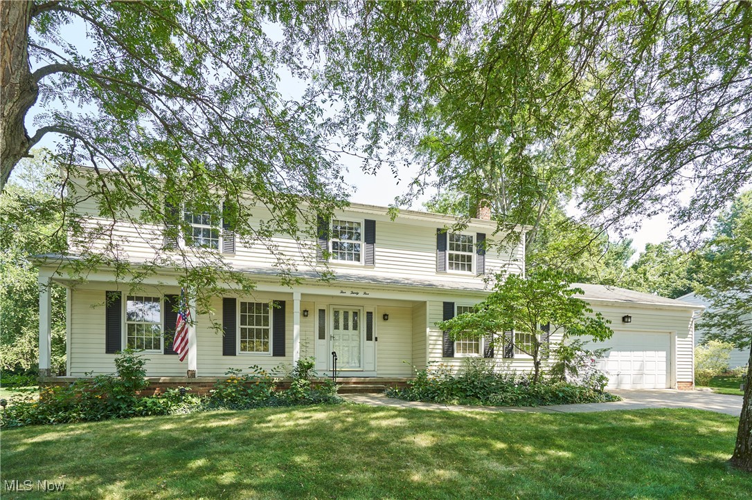 Wonderful 2 story colonial in Revere Schools. Refinished hardwood floors in most of the room. Foyer with wood floors. Family room with corner fireplace with gas logs. Kitchen with oak cabinets, granite counter tops, pantry with pull out drawers. Slider leads to deck with partial covered area and wonderful backyard. Off the back hall is a half bath - across from the half bath is a walk in closet with a shower- making a full bath on the first floor- could possibly be converted to a first floor laundry! On the second floor all 4 bedrooms and hall have wonderful refinished wood floors. The master has a walk in closet and Master bath with shower. Full bath updated, with oak vanity, newer subway tile surround tub and tiled floor! The lower level also has a finished rec and great space for storage. Don't miss out on this outstanding colonial located in Hills n Dales Neighborhood. Close to Cuyahoga National Park, Shopping, Highway , and Schools!!