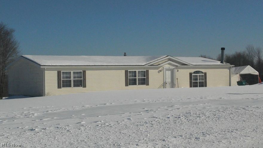 Move-in-ready and plenty of land? If that's what you've been looking for, be sure to check out this beautiful home on 14 acres in Hartsgrove! Large family room with wood fireplace will keep you warm on those cold winter nights.  Huge kitchen with island and breakfast bar and plenty of cabinet and pantry space.  All appliances except the basement freezer stay.  Master bedroom with glamour bath, as well as an additional full bath. New vinyl flooring in the master bathroom!  Full basement with walkout could be finished for additional living space.  Aerator septic installed in 2005. Mineral, oil and gas rights transfer to new owners! Don't miss out on this one, call today for your private showing!