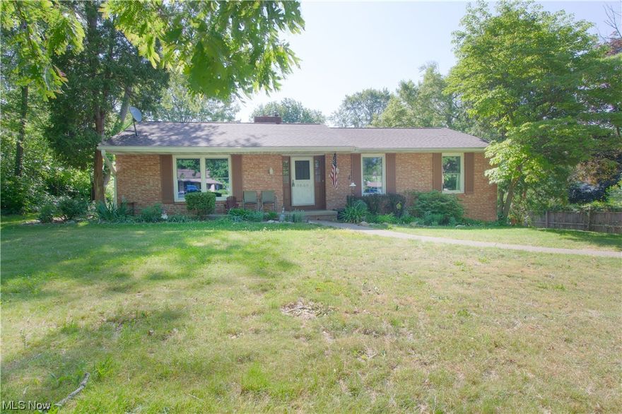This family-friendly brick ranch sits on a .63-acre lot in a charming neighborhood. The covered front porch welcomes you to this lovely bright and spacious, home with lots of character throughout. A cozy great room invites you in with an abundance of natural light and a modern color palette. The dining room features a fireplace, and sliding glass doors overlooking the peaceful backyard. Perfect for entertaining friends and family the backyard is ideal for enjoying warm summer nights. The kitchen offers a large pantry, an oversized stainless steel sink, ample storage space, and access to the side yard around the corner. The main floor is complete with 3 bedrooms and 2 full baths including the master suite with a private bath. The walkout basement offers a recreational room, office space, a half bath, a laundry area, and additional storage space. The attached 2-car garage, large patio, and basketball hoop complete the package. Great location - nearby schools and shopping. Updates include