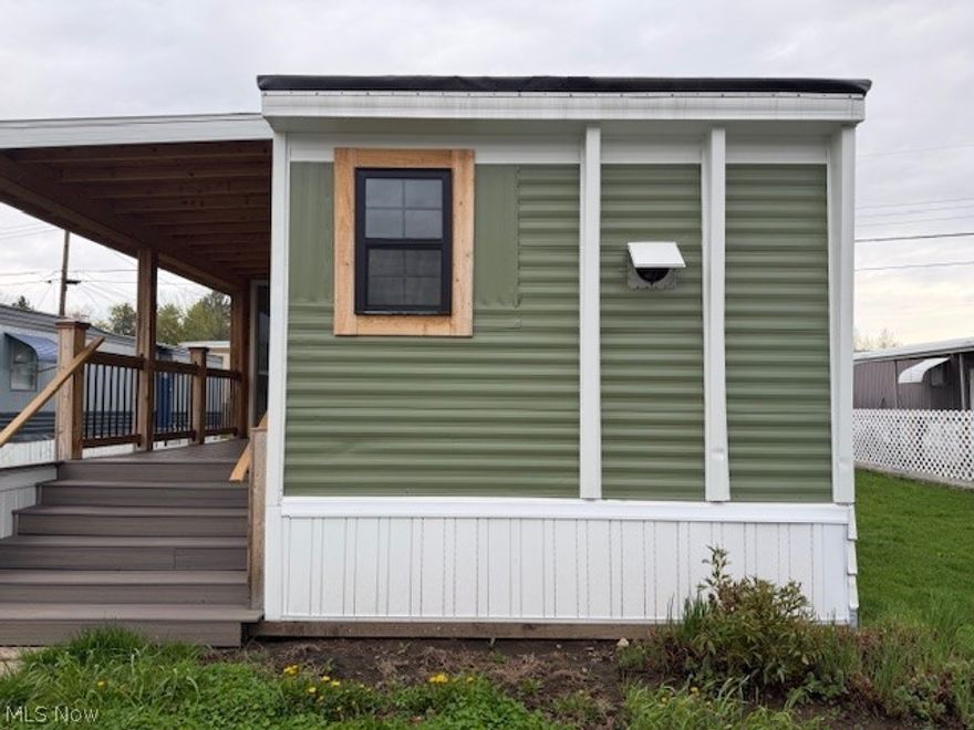 Completely renovated, like new 1-bedroom, 1-bath home. Updates include a new roof, windows, doors, siding, porch, plumbing, electric, HVAC, insulation, and skirting—offering the feel of a brand-new home. Features a bonus utility room, updated bathroom with new vanity and shower, and a separate storage shed. Low-maintenance living with all major systems already done.