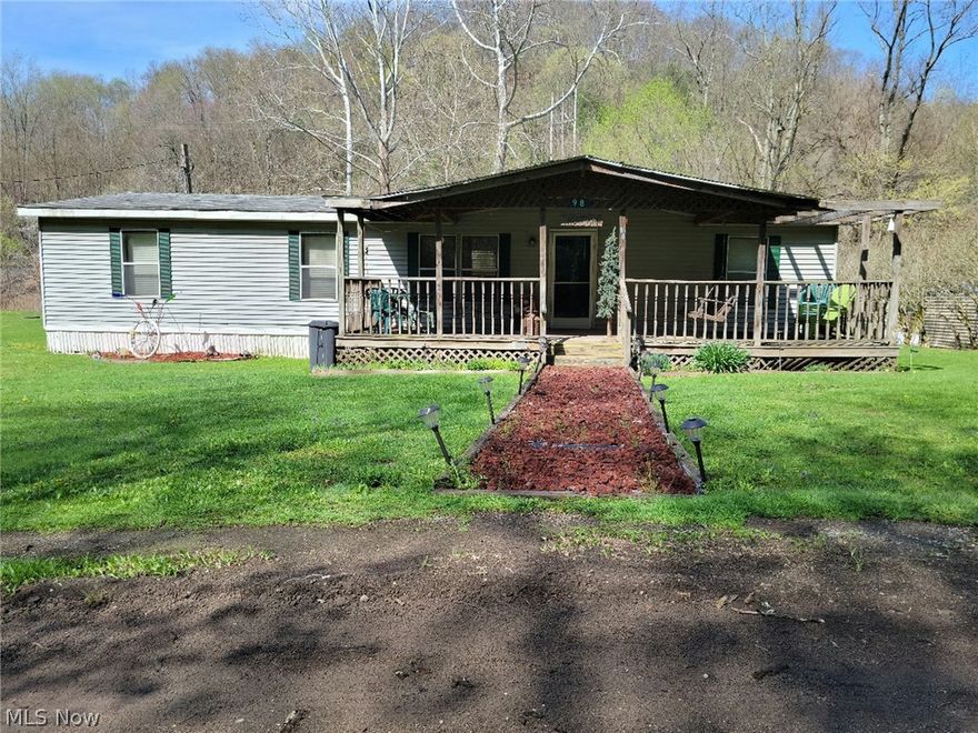 Double-wide mobile home on two parcels located in Irondale, OH.  Both parcels will be sold as one at live auction on Thursday, June 10, 2021 at 5PM. One master bedroom with bathroom.  Two additional bedrooms.  One additional bathroom.  Spacious living room/dining area.  Laundry room located off of the kitchen.  The mobile home will need a new roof and some work done on the floor in the bathroom.  Major appliances are selling with the property; washer, dryer, refrigerator, range.  The front porch is 28x9 and the back deck is 15x12.  There is a flat back yard with a storage shed, and the property borders Yellow Creek.  Real estate will sell as is, where is, and will sell subject to confirmation of the owners. Deposit of $1500 due day of auction. Balance due in 30 days.