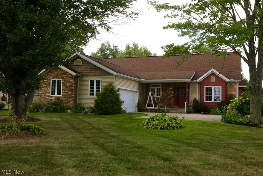 Superb craftsmanship in this custom built ranch. Vaulted ceilings give you spacious feel with the open floor plan from the kitchen to family room. One of the many perfect spaces this home has for entertaining.  The family room has beautiful hickory floors, and boasts a magnificent stone fireplace with custom made mantel and hearth. Loft that overlooks the family room can be used as office, play room, or just a place to relax. Large master bedroom has a built in fireplace, and spacious master bath. A gourmet dream kitchen with stone counter tops and hickory cabinets for all your entertaining needs. Finished basement with custom putting green. The backyard is a private oasis of its own. Two stone patios connected by a stone walkway. On hot summer days you can relax in the shade under the pergola and listen to the sounds of the waterfall or sit and enjoy breakfast on the charming vinyl deck. This home has to many upgrades to list. Close to shopping and dining. Don’t miss out on this beaut