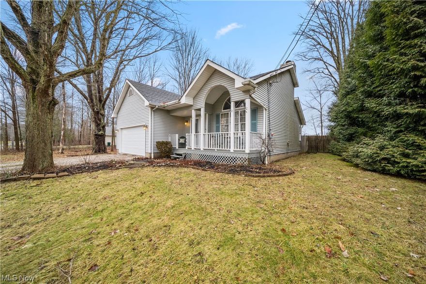 Welcome to your new home in Roaming Shores! This stunning 3-bedroom, 2.5- bath residence is a perfect blend of comfort and luxury. With a 550 acre  private lake, its ideal for recreational boating+ fishing. Other amenities include 2 pools,  beaches, club house, playgrounds, pavilions and basketball and volleyball courts to enjoy. As you step inside, you'll be greeted by the warmth of a cozy fireplace, creating a welcoming ambiance for family gatherings or quiet evenings. The Main level boasts an eat-in kitchen with granite countertops, Kraftmaid cabinets and stainless steel appliances. Spacious living area and convenient half bath for guests including a master suite and private bath. Upstairs features 2 more bedrooms and a full bath. The finished basement provides additional living space, perfect for a home office, gym or entertainment room. One of the stand out features of this property is the fenced-in backyard, offering both privacy and security. Imagine summer barbecues or relaxing evenings on the deck.   The extra lot adds versatility to the outdoor space, providing room for gardening, a play area , or even expansion possibilities. Worried about the changing seasons? Fear not! This home comes equipped with a new furnace and AC, ensuring comfort and energy efficiency year round.