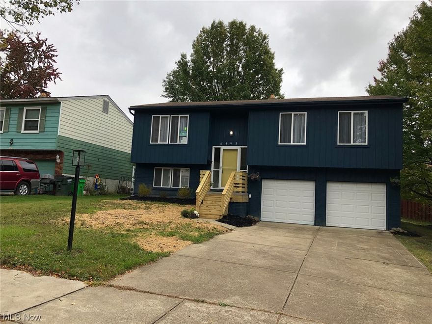 Welcome to your dream home in the Saybrook Hill neighborhood. This stunning 3 bed, 1.5 bath house has been meticulously remodeled with designer touches that offer modern living. The house has been freshly painted inside and out, along with stunning custom new stairs and rails that help with the wow factor.  The new stylish lighting shines on the new easy-care flooring throughout. 
Walk into this split-level home and up to the stylish kitchen that features soft-close cabinetry, beautiful granite countertops, and boutique tile backsplash. All the stainless-steel appliances are set in the perfect location to make cooking and cleaning a breeze.  
The dining and living spaces are open and welcoming, perfect for spending time with family and friends. Next to the dining room is a wonderful sunroom that leads to a deck, just right for a BBQ, and/or bistro table and chairs.  The deck also offers stairs that lead to the backyard.
Down the hallway, you are greeted with a beautifully updated bathroom that boasts a deep soaking tub with rain shower head and stunning tiled surround that includes a shampoo niche.  Next you can choose your new bedroom from out of the three available.  All rooms have wonderful light from the large windows and comfy carpeting for soft landings.
The downstairs offers a family room with attached half bath, there is also a mud room that includes both washer and dryer.  You can head out to the two-car attached garage that enjoys insulated garage doors with openers to keep you protected from the unpredictable Ohio weather.  This fabulous home is conveniently located minutes away from Garfield Commons Center for easy shopping, working out, and dining, etc.  Freeways are just a hop, skip and a jump away. And the Valley View Woods Park is a stone’s throw away for all outdoor enthusiasts.