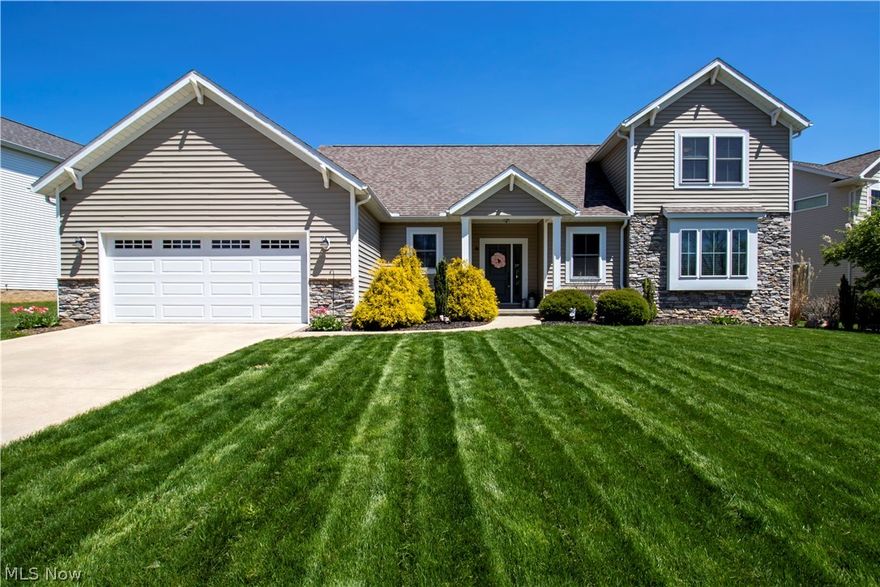 This amazing home has a floor plan inspired by the way you actually live, wonderful 3 bedroom home with open floor plan that includes smart storage solutions. The 1st floor features a home office, large laundry/mud room with built in hooks and bench, wonderful open great room, spacious kitchen with center island and walk in pantry, large dining area, half bath and large owner's suite and bath with large tiled shower, granite vanity and spacious walk-in closet.  The office provides room for work or play. The home features oversized windows, rustic laminate flooring, painted trim and 9' ceilings on the main floor to make the open great room - kitchen - dining area light and bright. The 2nd floor features 2 spacious bedrooms that share a hall bath with double vanity.  The lower level is complete with a full bath and plenty of space to finish if you need additional living space.  The current owner just completed a 15x16 covered patio overlooking the back yard.  The exterior, earth tone sid