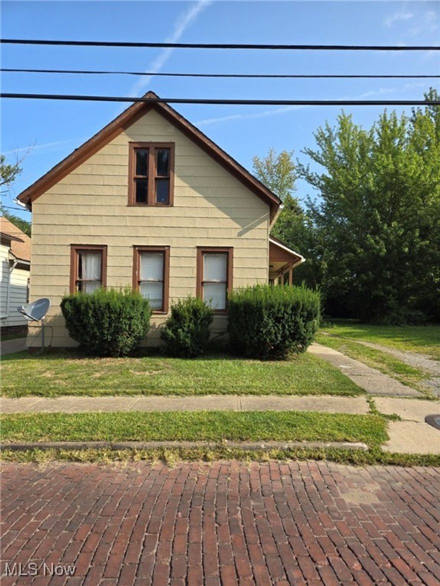 CALLING ALL INVESTORS!!! This duplex is an estate and waiting for someone to bring it back to its original glory. Very convenient location off E. 71st Street near the Cuyahoga Heights/Cleveland border. The property is being sold AS IS. No repairs paid for by seller. The front unit is vacant and the smaller of the two units. The furnace for the front unit is in the living room. It could possibly be moved to the 2nd bedrm which is rather small off the kitchen area. The furnace for the back unit is in the attic. Age of roof, heating, siding and windows are not known. There are no seller owned appliances. The back unit is currently rented on a verbal agreement with no written lease and no security deposits collected. The back tenant is paying under market value of $550.00 and has lived there for 7 years. The seller pays for gas, electric, water & sewer. There is only one meter system for both units. Access to the tenant occupied unit is limited. Buyer will only be able to view the front unit. There is a wet basement and one plumber said the main plumbing stack is cracked. There is at any given time several feet of water in the basement. The basement has an outdoor hatch that is in need of repair. There is no garage and driveway is deteriorated. There is peeling paint and likely asbestos type siding. The square footage and history of home cannot be verified. Executor never lived in the home and the executor NEVER had the home tested for pest, lead based paint, radon or asbestos. Private professional inspections of all kinds are encouraged by the seller at the buyer's expense. Come see and make an offer today!