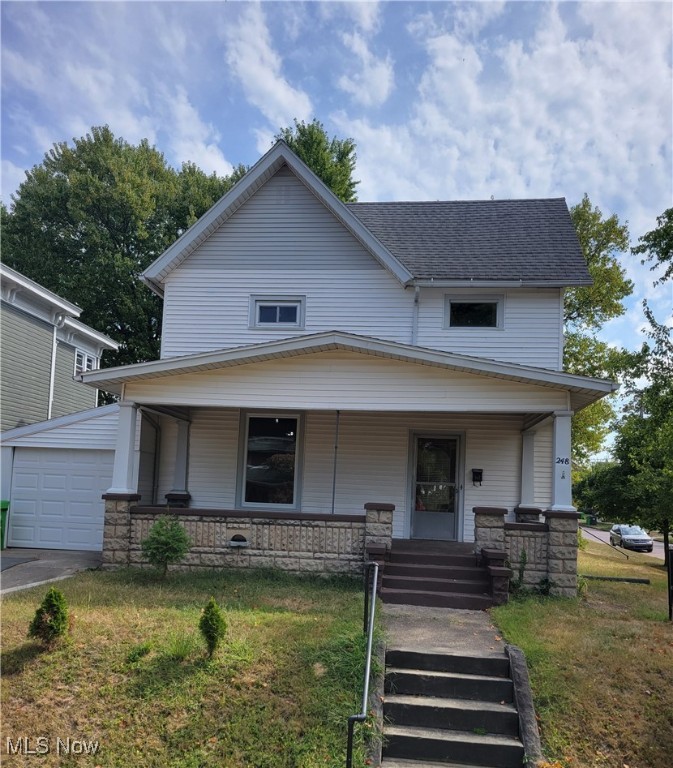 This home has the beauty and charm of a bygone era while maintaining the comforts of the modern day family. It is situated in the Old Town section of Coshocton. It boasts well cared for original oak woodwork and floors, beautifully renovated kitchen and baths. Electric and plumbing have been updated, windows have all been replaced. New light fixtures have been added with some original lighting to keep the vintage feel. The spacious bathroom has double sinks, stand alone tiled shower and soaking tub. The kitchen has an open concept feel with all new cabinetry, farmers sink, tiled backspace, butcher block counter tops, smart core laminate flooring and all new appliances. The main floor consists of a laundry room with washer/dryer hook ups and utility sink, living room with vintage decorative fireplace, family room with another decorative fireplace, a bedroom with pocket doors, dining room, kitchen and full bath. This home has over 2300 sq ft of living area. 4 bedrooms, 2 full baths, and an attached 1 car garage. A large front porch for catching the summer breeze. A home warranty is being offered. This is a must see!