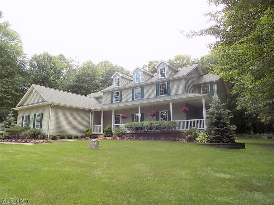 Immaculate custom built Colonial on 2.4 wooded and professionally landscaped acres in Sharon Twsp*From the moment you walk up the front sidewalk, you will see the wraparound porch with inviting space to sit and enjoy the private setting*Dramatic 2 story Foyer with open turned staircase*Formal Living Room with glass French doors and DR with chair rail and crown molding*The light and bright kitchen is a cook's delight and features white cabinets, granite counters, newer SS appliances, huge center island and a breakfast bar*Enormous vaulted Family Rm with fireplace opens to Sun Room with vaulted ceiling, large wet bar and lots of windows and slider to brick paver patio*There’s a 1st floor laundry/mudroom and a Half Bath*Views out of the many windows at back of the house are of the spectacular mature trees & lush landscaping*Upstairs you will find a Master suite with gas log fireplace, vaulted ceiling and Glamour Bath with huge soaking tub, a shower, 2 separate vanities & walk-in closet*3