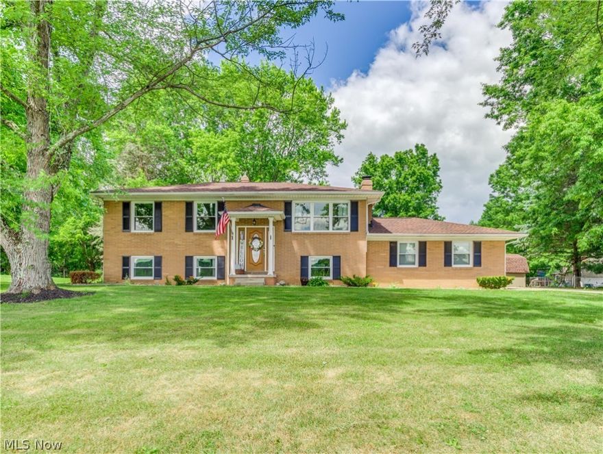 Welcome home to this fully updated, beautiful home in desirable Jackson Twp. As you enter through the front door, you are greeted by a bright and inviting space. The main level boasts 3 spacious bedrooms, an updated full bath with Bluetooth speaker in the shower and a gorgeous open concept layout. The fully renovated kitchen hosts custom Amish built cabinetry, a large island bar & stunning granite counters and backsplash. The lower level is finished with a large living space complete with a brick fireplace, a bonus space and an expansive 4th bedroom. A full bath and laundry area complete the lower level. Big-ticket items replaced and updates include: roof 2017, windows and doors 2020, Lifeproof Luxury Vinyl floors 2020, 200 amp electric service 2020, furnace and hot water tank 2017, kitchen appliances 2018, kitchen cabinets and counters 2018 and vinyl siding 2021.