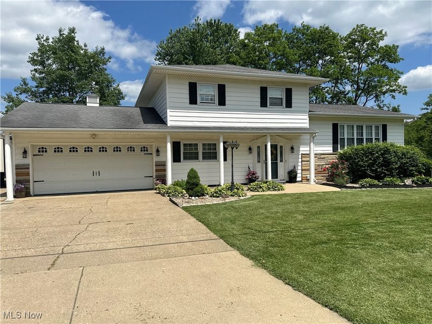 This beautifully updated 4 bedroom, 3 full bath home is just what you have been looking for!! Located on corner lot in Rolling Hills School District. You'll feel right at home from the moment you step inside the nice big open foyer area that leads to the spacious  family room. There is also a nice bright cheery sunroom that over looks the nicely landscaped fenced back yard. On up to the next level you'll find a beautiful newer kitchen with plenty of white cabinetry and gorgeous Quartz countertops. Comes with all the stainless steel appliances. Nice big formal family room for entertaining that adjoins to the dining room and has sliding patio doors to take you out to the the 2 tiered deck. Upstairs is the Owners Suite with its own full bathroom, along with additional 2 bedrooms and full bath. 4th bedroom is on the main floor. Outside in the rear of the home is a nice concrete patio with small fire pit to enjoy those summer evenings. We also have a 2 car attached garage, concrete driveway and storage shed. Call today for your own personal tour.