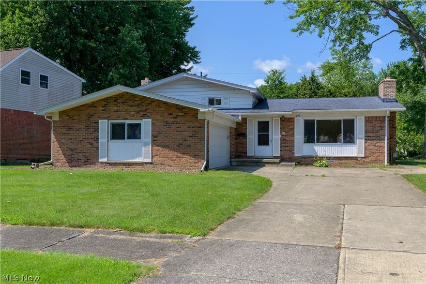 Beautiful Split Level Home with 3 bedrooms and 2 full baths ready for to be purchased in the University Heights neighborhood in Elyria! This property features a Formal Living Room with a fireplace, Formal Dining Room and large lower level Family Room. The kitchen is spacious with newer dishwasher and Range/Oven. Lower level Family Room is great for entertaining with a wood burning fireplace.  The upstairs has three large bedrooms and main bathroom. The lower level is finished off with a Utility/Laundry room along with a full bathroom.  This home has a covered patio and nice size yard.  The attached two car garage has plenty of storage space. Call now for your private showing!