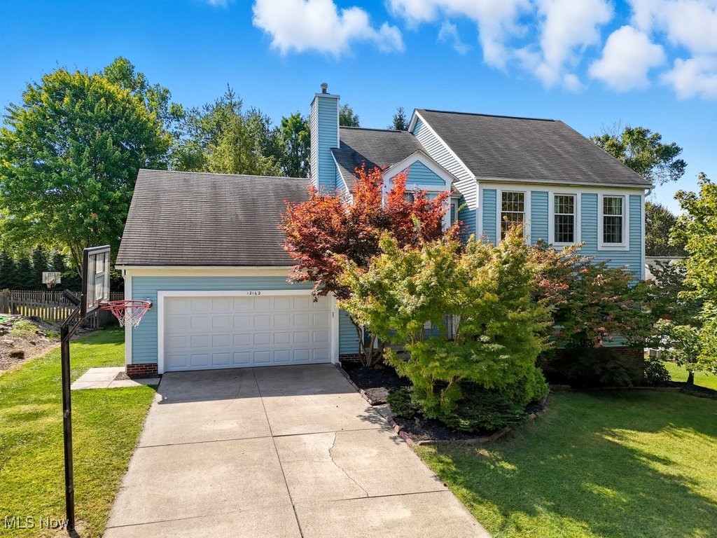 Nestled in Twinsburg’s desirable Meadowood neighborhood, this inviting 3-4 bedroom, 2.5-bath home offers the space and comfort every family needs for both everyday living and entertaining. The main level showcases a two-story foyer, inviting living room and formal dining room with new flooring. The kitchen is well appointed with island and spacious eat-in area, which opens to the family room with a fireplace. Additionally on the main floor is a convenient half bath and laundry room complete with ample cabinets. Upstairs, you’ll find new flooring, a spacious primary suite complete with an en-suite bath, two large closets and attached bonus room great for an office, nursery or whatever you can dream up. Also, upstairs are two additional bedrooms and a large double sink full bath. The partially finished basement offers endless possibilities, plus abundant storage. An expansive deck overlooking the large back yard is great entertaining. New flooring (2025) in much of main level and upstairs. Prime location close to shopping, hospitals, freeways, restaurants, parks, school, playgrounds, and recreation! The perfect place to grow, gather, and make memories. Schedule your showing today!
