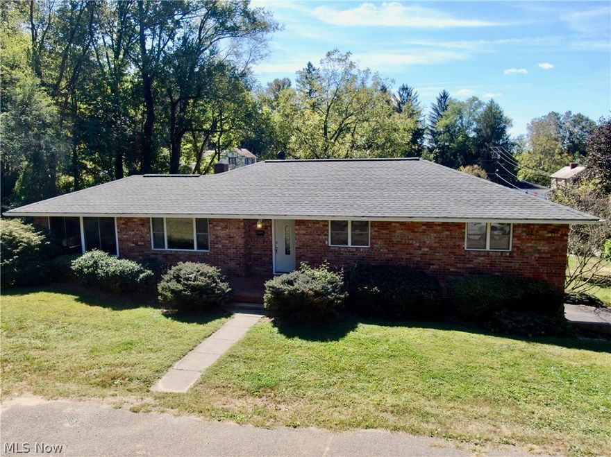 A beautiful ranch-style, brick home that comes with an attached, 2 car garage and paved driveway! This 1344 sqft home includes a kitchen with beautiful hardwood floors, 3 bedrooms, 1 3/4 bath and a partially finished basement with a wood-burner, perfect for entertaining the family and keeping cozy in the winter! In the summer months, relax and enjoy the sun room or large yard!