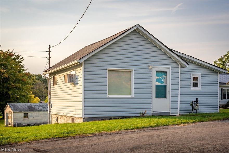 Cute house on 1/2 acre in a nice location. This home has been well maintained with a newer roof, furnace, water heater, updated plumbing plus a new well pump with separate filter and softner. The entrance to the basement is at the back patio. The lot is flat and open with a detached single car garage. Short distance  to stores and restaraunts on Canton Rd.