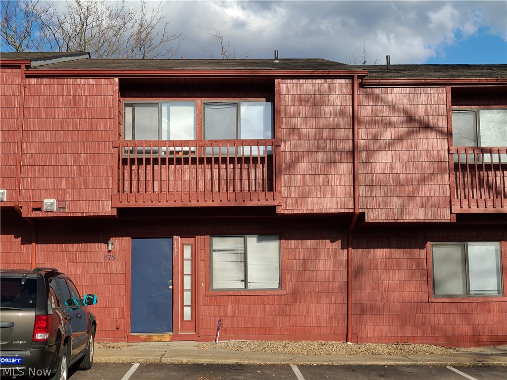 680 E Buchtel Ave is an awesome layout condominium with 5 bedrooms all with own keyed lock doors, 5 bathroom condo so each person has their own toilet and sink and then shared tub/shower for the 4 units upstairs and the 1st floor bedroom has a full hall bath to use. Condo also has an in unit laundry room on the 1st floor. The galley kitchen off the HUGE Living Room comes complete with refrigerator, stove and dishwasher. There is also a nice patio off the Living Room with 2 separate large sliding glass doors with small yard for your use. There is plenty of parking with tons of parking spaces and you can park in the lot right in front of the entry to each building. The condominium fee covers the exterior and the trash. These unique designs were originally built for off campus student housing however they can be rented to separate individuals as room rentals or they can be rented to a group for group homes or families or even an office space for this low cost! There are several condominiu