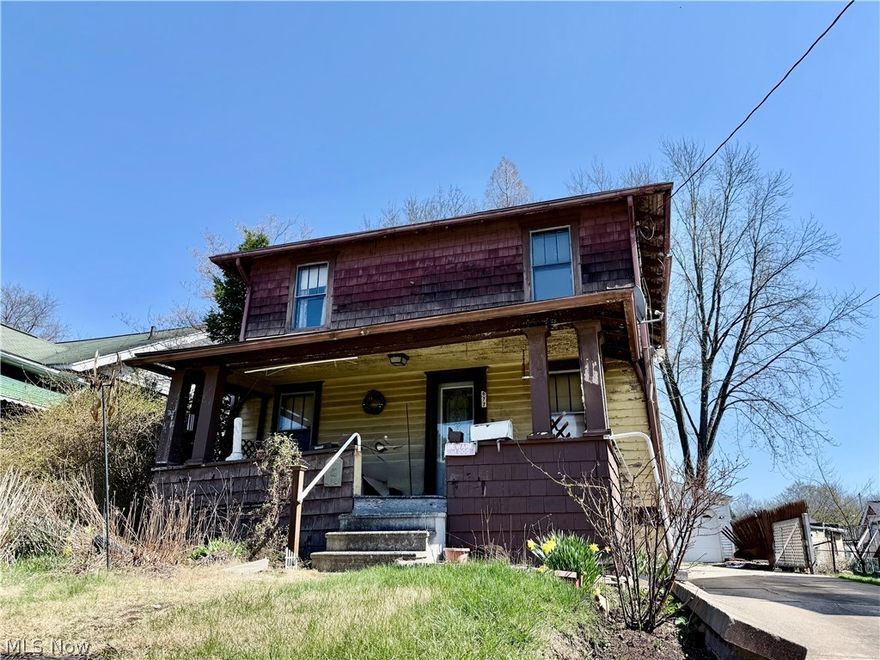 Traditional colonial with a large front porch and an OVERSIZED 2.5 car garage.  This is the perfect opportunity for investors.  Call your REALTOR today!