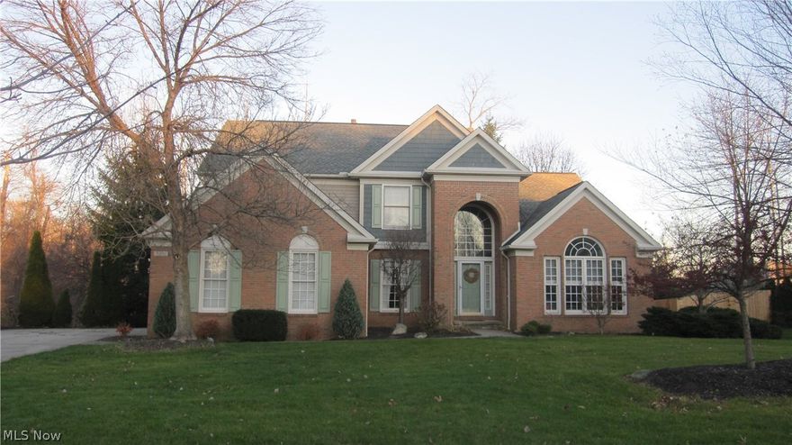 Walk in and fall in love with this beautiful home...immediately feel welcome in the two story open foyer featuring hardwood floor expanding to great room and dining areas.  Let the exceptional wall of windows in the huge great room draw you in, featuring a 2 story fireplace open to kitchen for extra warmth. A butler pantry provides additional cabinets and counter space. An enormous kitchen with tile floor, deep pantry and island, perfect for gatherings and open to 2 tiered deck with 220 line, leading to private yard.  Find ultimate flexibility with a spacious first floor vaulted den and vaulted master bedroom with walk in closet and private bath. Powder room and laundry room with laundry tub on first floor. 3 additional bedrooms and full bath with dual sinks on second floor. Unlike others, this home is neutral and light. Brand new carpet installed Nov 2015, new AC/Furnace/Hot water heater(all 2014), roof (approx 2009). Easily move in and enjoy. Full large basement with plumbing rough i