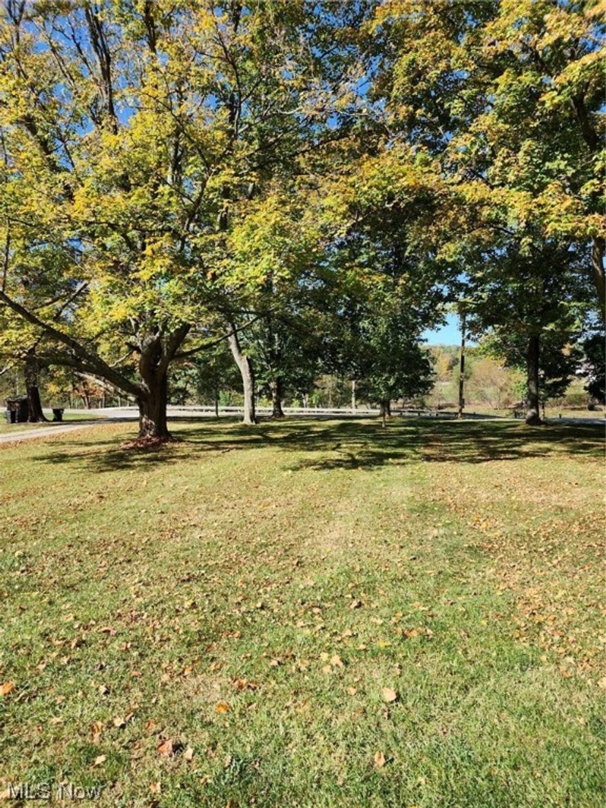 this 2.617 lot has 2 pole barns and a shed!