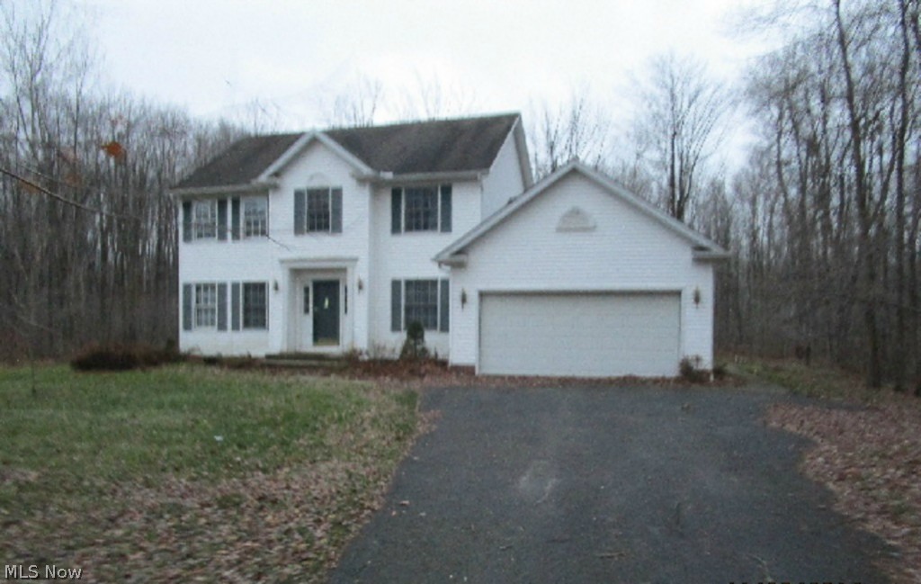 Over 2 acres of land in Chardon can be yours! Huge colonial home sits back in deeply wooded lot. Features include 4 bedrooms, 2.5 baths in over 2370 sq.ft. of living space! Welcoming 2-story foyer entry. Formal living room. Formal dining room with wood floor. Gourmet kitchen with center island opens to casual dining area with glass sliders to custom wood deck in back yard. Family room complete with red brick gas fireplace adds to the coziness. Spacious bedrooms upstairs. Master suite with private bath with dual sinks and large walk-in closet. 2-car attached garage. Separate laundry room, plus half bath. Full basement for storage. Needs some TLC and remodeling to make this your castle! Employees and family members residing with employees of Bank of America, N.A., its affiliates or subsidiaries are strictly prohibited from directly or indirectly purchasing any property owned by Bank of America, N.A. All offers must be submitted with a pre-approval letter or proof of funds.