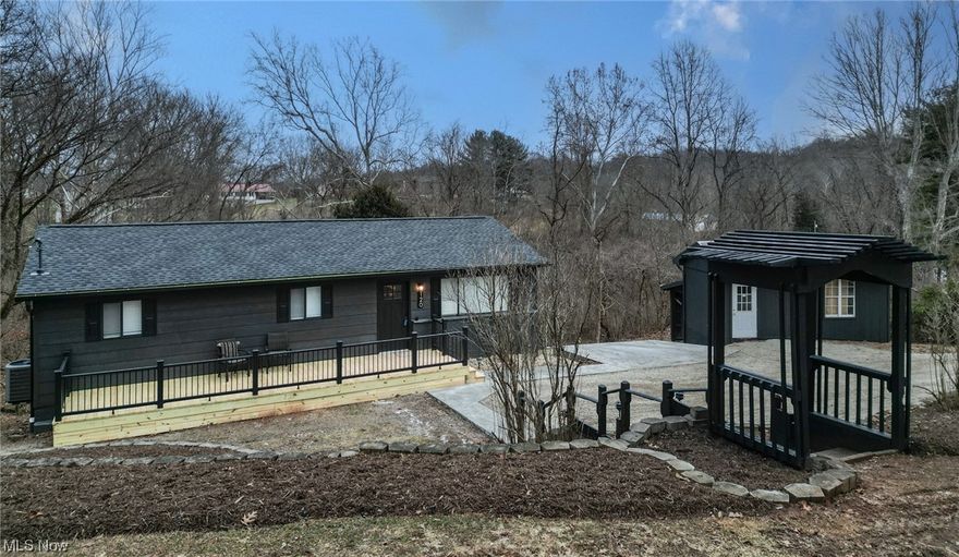 Want a home you can move right into and not do a thing? Look no further. This three-bedroom two-bathroom home has it all. From its cozy fireplaces to the custom-made cabinets, granite countertops, and stainless-steel appliances to bathrooms featuring a tile shower, and new vanities.  Downstairs there is a large rec/living room. Sliding glass doors off the kitchen and the basement will put you out onto a large back deck with a beautiful countryside view. The home features a new roof, floors, doors, AC, duct work, heating and much more. Outside has a concrete parking pad and a storage shed. All of this with the convenience of just minutes from town. This is BRAND NEW with the same great bones! Call for your showing today!