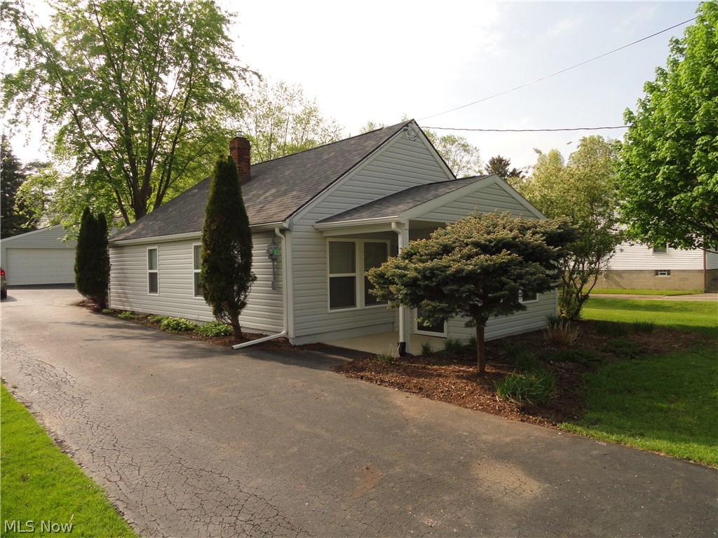 Nice Ranch/Bungalow in convenient Stow location. Completely gutted and remodeled with quality workmanship! New vinyl siding, windows, roof ,furnace, electric, plumbing, kitchen, bathroom, beautiful hardwood floors ,carpet and more. Attractive wood floors and impressive kitchen new cabinets and appliances too. Newly added front porch and second bedroom. Nice paved driveway to the two car garage. The lot extends to the street behind the house, could make a second driveway or possible sub divide one day. Very pleasant home may be just right for you?