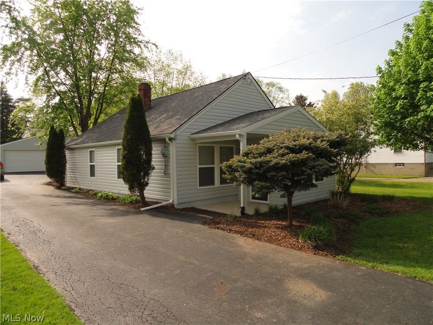 Nice Ranch/Bungalow in convenient Stow location. Completely gutted and remodeled with quality workmanship! New vinyl siding, windows, roof ,furnace, electric, plumbing, kitchen, bathroom, beautiful hardwood floors ,carpet and more. Attractive wood floors and impressive kitchen new cabinets and appliances too. Newly added front porch and second bedroom. Nice paved driveway to the two car garage. The lot extends to the street behind the house, could make a second driveway or possible sub divide one day. Very pleasant home may be just right for you?
