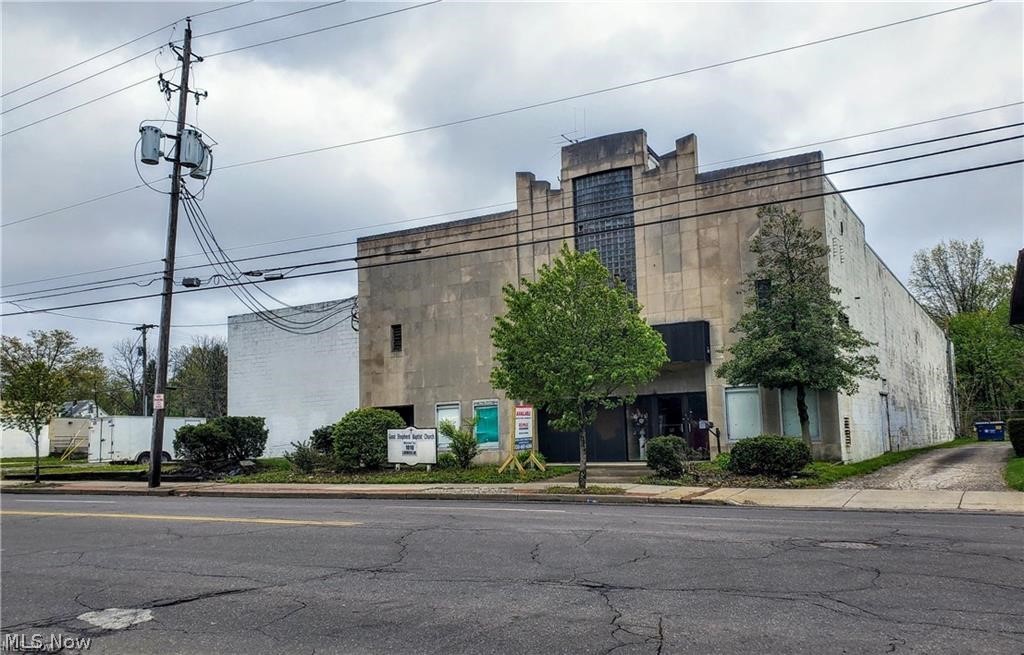 Great investment opportunity in West Akron! Large commercial use property conveniently located on Copley Rd. between 77 and downtown. Building is currently vacant, was previously used as a church, radio station and a movie theater. Plus it's a combined total of 8 lots = 2+ acres. Fenced in parking area with electronic security gate. Don't miss this opportunity to rehab this historic building (former WAKR radio station) or demo the building and build to suit. Additional parcels include 68-21900, 68-21904, 68-21905. Sold as is, building needs lots of work. Much of the value is in the land.