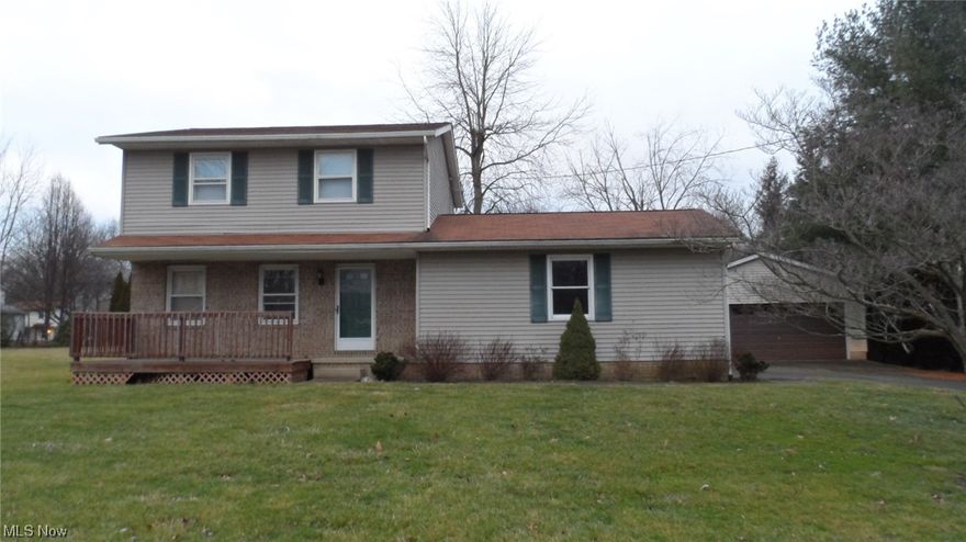 Charming 3 bedroom colonial with living area w/ wood floors,  open eat-in kitchen w/appliances, desk area and plenty of cupboards.  Sliding doors go to bonus room w electric heat and access to back yard.  Basement offers partially finished room and additional laundry area.  Attached 2 car garage and detached 2 car garage with cement floor.  Estate--SELLING AS IS