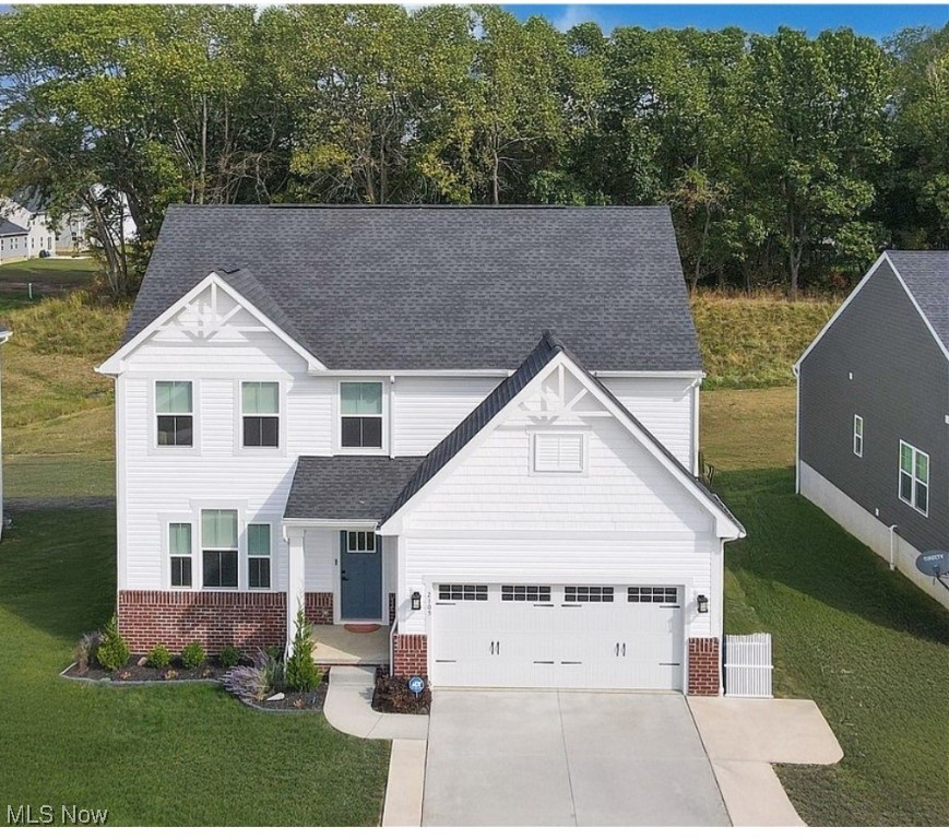 If you love the idea of sleeping in a peaceful rural setting with access to public water and sewer, then 2105 Sugar
Maple may be the perfect home for you! This stunning conventional-style home was built in 2022 and finished in
2023. It boasts high ceilings, upgraded granite countertops, tall cabinets, and an abundance of storage space,
including a pantry and a ten-foot island. Enhanced LVT flooring adds a wonderful combination of elegance and
comfort.
The main floor features a master bedroom with a beautifully designed tray ceiling, a thoughtfully appointed
master bath, and a generously sized walk-in closet with custom-built-ins. Additionally, there is a guest half bath,
main floor laundry, and a home office that can be used as an additional bedroom, allowing for a total of five
potential bedrooms.
On the second floor, you'll find a spacious living area, two large bedrooms—one of which has a walk-in
closet—and a full bath. Don't overlook the lower level, which includes an additional room currently used as a
bedroom (note that there is no egress window; feel free to ask your favorite agent for more details!). This space
also offers two built-in closets, a built-in desk, another living area, and a plumbed wet bar or potential kitchen
sink area, along with a full bath.
This home provides plenty of storage, charm, and easy access to all the amenities the township has to offer, all
while maintaining a cozy country feel. The neighborhood features walking paths, and the neighbors are
wonderful!