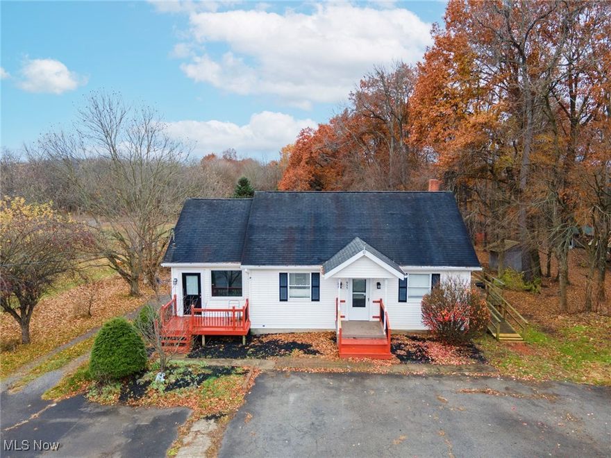 7 mostly wooded acres with a Cape Cod-style home in Washingtonville. The main level features a master bedroom with a private full bath, a living room, a full hall bath, 2nd bedroom, and a rear sunroom. The walk-out lower level that is partially finished features a rec-room, storage room, plus a possible 3rd bedroom with a separate walk-out entrance and shower, commode, and laundry hook-up. Several decks and a 2-car garage. Ample parking in front and behind the home. The 7 acres feature a pavilion and several older cabins. Great property for recreation. Convenient location!