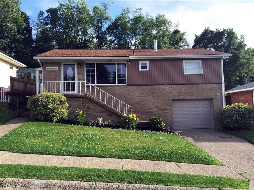 If price, location, and condition are important to you, look no further! You'll love the one level living in this nicely updated, well maintained, cozy home conveniently located in Weirton just minutes from RT 22. Tastefully decorated and welcoming, this home is located near the end of a cul-de-sac and feature 3 bedrooms, 2 baths, beautiful hardwood floors, a nicely landscaped yard, updated kitchen and baths, a one car garage, newer roof, furnace, central air, hot water tank, carpet, and more! It's all been done for you ~ just move in and enjoy! Includes Money Back Guarantee!