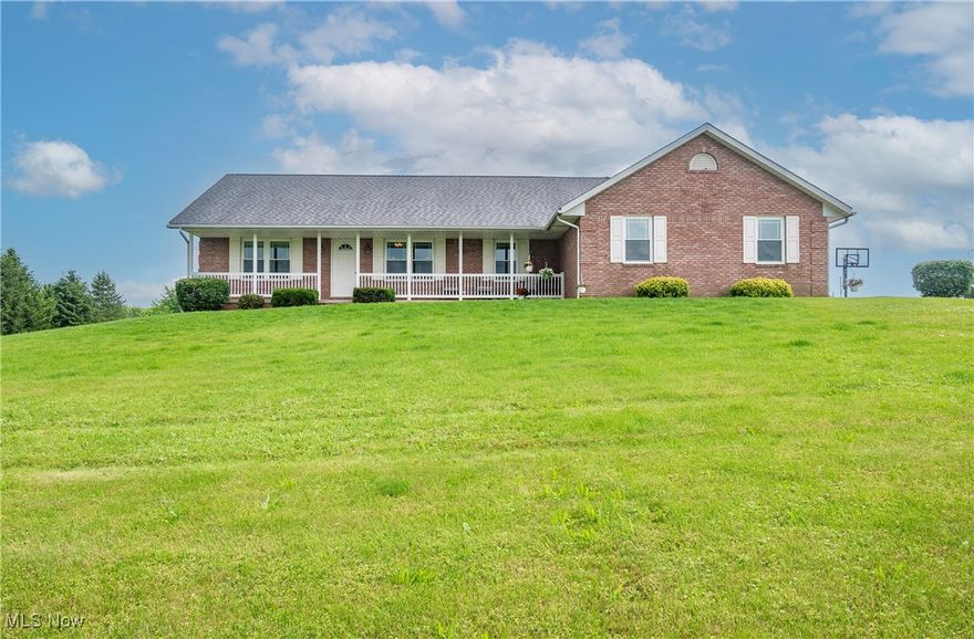 Welcome to your dream retreat! This beautifully maintained 4-bedroom, 3-full-bath ranch offers 2,622 sq ft of comfortable living space, nestled on a picturesque 3-acre lot with sweeping country views. Step inside the inviting foyer that leads to a formal dining room-perfect for hosting gatherings. The cozy living room features a fireplace, creating a warm and welcoming atmosphere. The spacious kitchen, complete with an eat-in area, invites culinary creativity and opens onto a stunning deck where you can enjoy peaceful backyard vistas. The owner's suite is your personal sanctuary, featuring a generous walk-in closet and a large private bathroom. Two additional bedrooms and a second full bathroom are located on the main level, along with a spacious laundry room, oversized pantry, and ample storage areas. The walk-out basement offers a full living space ideal for an in-law suite or guest quarters. It includes a second kitchen with quartz countertops (new in 2022), a large living area, full bathroom, and direct access to a charming patio. Outside, enjoy a 4-car garage with 8-foot doors, 2 storage sheds, and an inground fire pit. Recent updates add peace of mind, including: New furnace and windows (2022) Newer water softener and reverse osmosis system (2022) New flooring throughout (carpet & bathrooms, 2022) Fresh paint throughout (June 2025) Basement waterproofed with transferable warranty (June 2025, Ohio Waterproofing). Home Warranty included! This is country living at its finest-peaceful, private, and perfectly updated. Don't miss your chance to make it yours!