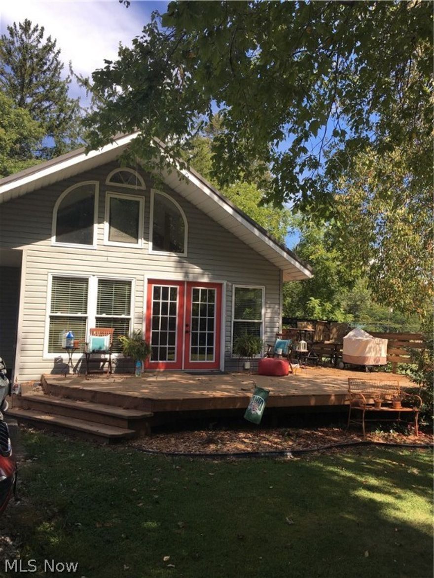 The is a nicely updated house that sits on 1.99 acres with a county setting and woods in the background. The owners have put a lot of TLC into the house and have updated the following: new metal roof in 2013, new hot water tank in 2017, new master bath in 2015, new patio area in 2011, new fire pit in 2013 and new partially finished basement in 2013. The house features beautiful hardwood floors throughout the living and dining room area and bedroom.  The kitchen has plenty of cabinet space with a bar for extra seating. The family room features a cathedral ceiling with a bonus room upstairs that could be turned into an additional bedroom.  There is also additional space upstairs that could be finished off for additional living area or another added bedroom.  Basement has plenty of storage and more could be finished off for additional living space.  This home has many opportunities for adding on if desired due to the land that is around it.  There is a shared driveway to property. Back ya