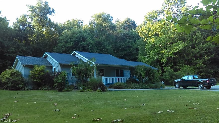 AWESOME RANCH!!! Nothing to do but move in! Inviting 20x7 Front Porch. New carpet and laminate just installed in Living Room, Family Room and Kitchen. The Covered Back Deck is great for Entertaining with Two Ceiling Fans for Comfort and a size of 36x18 Feet. There is a Propane Fireplace plus a Wood Stove for those Cold Winter Nights. The Property is a secluded 10+ acres of wildlife for a hunters paradise or the person who is a wildlife enthusiast!!  A MUST SEE... SET YOUR PRIVATE SHOWING TODAY!!!