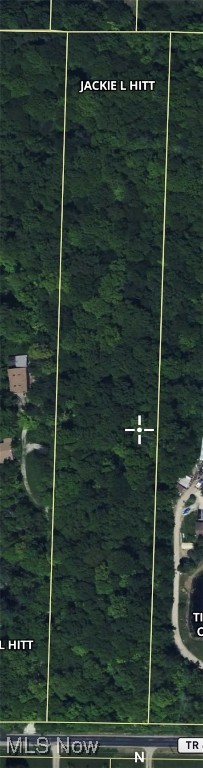 Build your new home on this rare five acre all wooded lot with mature trees in Chatham Township. The soil test for a household sewage system is complete. Water is available at the road (buyer to verify the availability and tap fee).