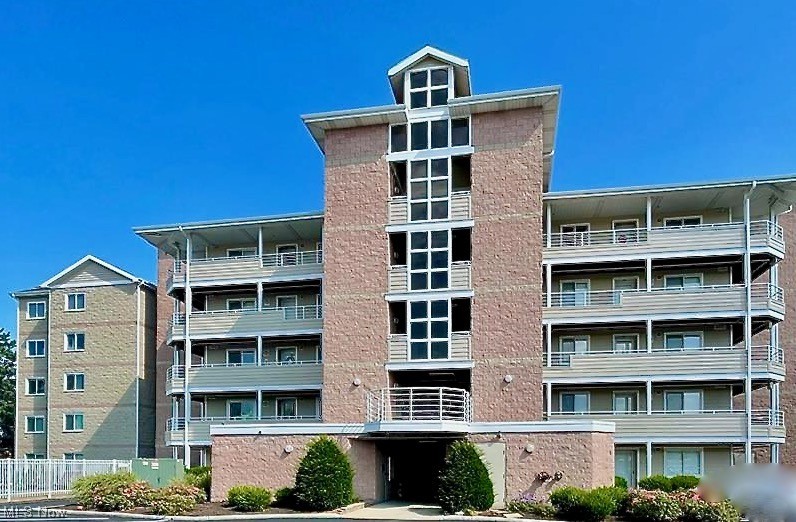 Welcome to 32 Marina Point! This freshly painted 2 Bedroom, 2 Bathroom Condo is tucked behind Castaway Bay, within the Marina Tower Condos and The Harbour complex. It is Move-IN ready, well maintained and comes FULLY Furnished! Updated Kitchen (2023) - Expanded opening into family room, NEW Quartz countertops, Stainless sink & faucet, NEW Cabinets. NEW Windows - tinted & filled w/argon gas (2021), NEW HVAC (2012). NEW carpet (2019). In-unit laundry and the washer/dryer stays! Snuggle up to the corner Fireplace, while you enjoy the amazing waterfront view! Added bonus - Enclosed 4 Season Patio looking out at the Castaway Bay Marina (dockage available). This condo is located on the Pipe Creek waterway leading into Lake Erie; a true boater's community! Marina Towers living offers a variety of amenities: Private pool that can be seen from your front door, Fitness center/locker rooms, Community room (reserve for events), NEW Tennis/Pickle Ball courts, a Basketball court and a Dog Park!